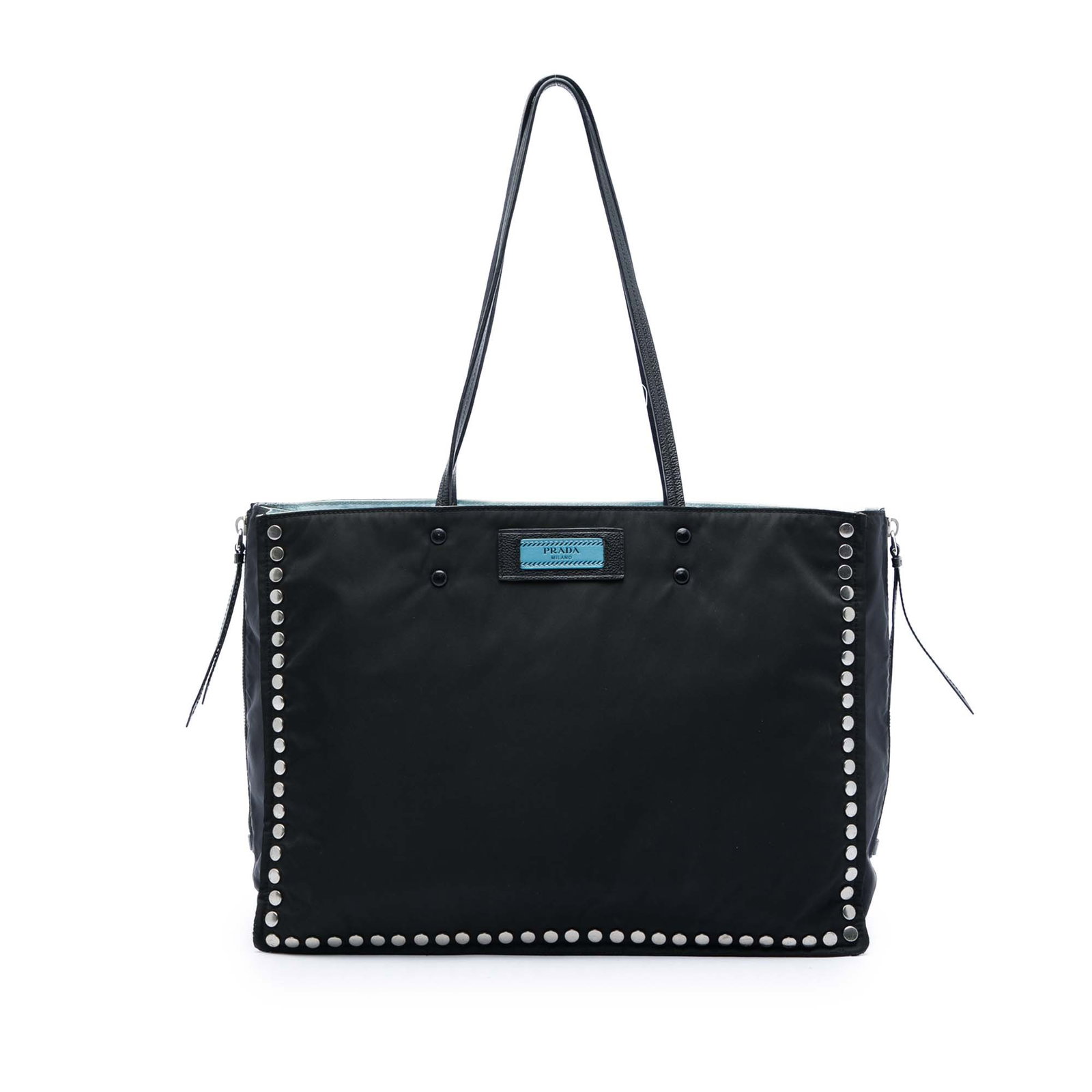 Prada Etiquette Studded Tessuto Nylon Tote Bag Black: Prada Etiquette Studded Tessuto Nylon Tote Bag Black Prada Etiquette tote crafted with a nylon body and stud details. It features flat leather straps, an open top, and interior zip pockets. Condition 