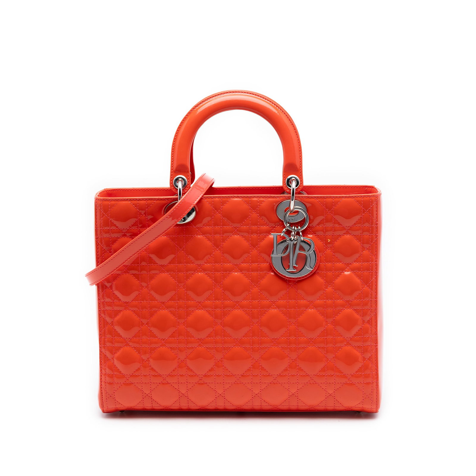 Dior Lady Dior Large Patent Leather Orange Bag: Dior Lady Dior Large Patent Leather Orange Bag This Lady Dior handbag features a quilted patent leather exterior in orange, accented by flat leather top handles and a detachable flat leather strap. It