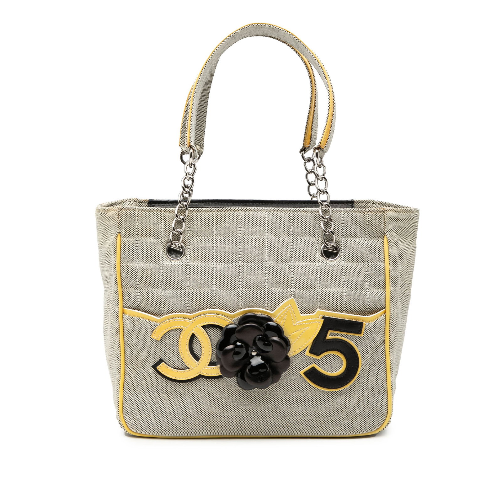 Chanel CC Camellia No. 5 Choco Bar Gray Canvas Tote Bag: Chanel CC Camellia No. 5 Choco Bar Gray Canvas Tote Bag Chanel CC Camellia No. 5 Choco Bar tote crafted with a canvas body and patent leather trim. It features curb chain straps, an open top, a front 
