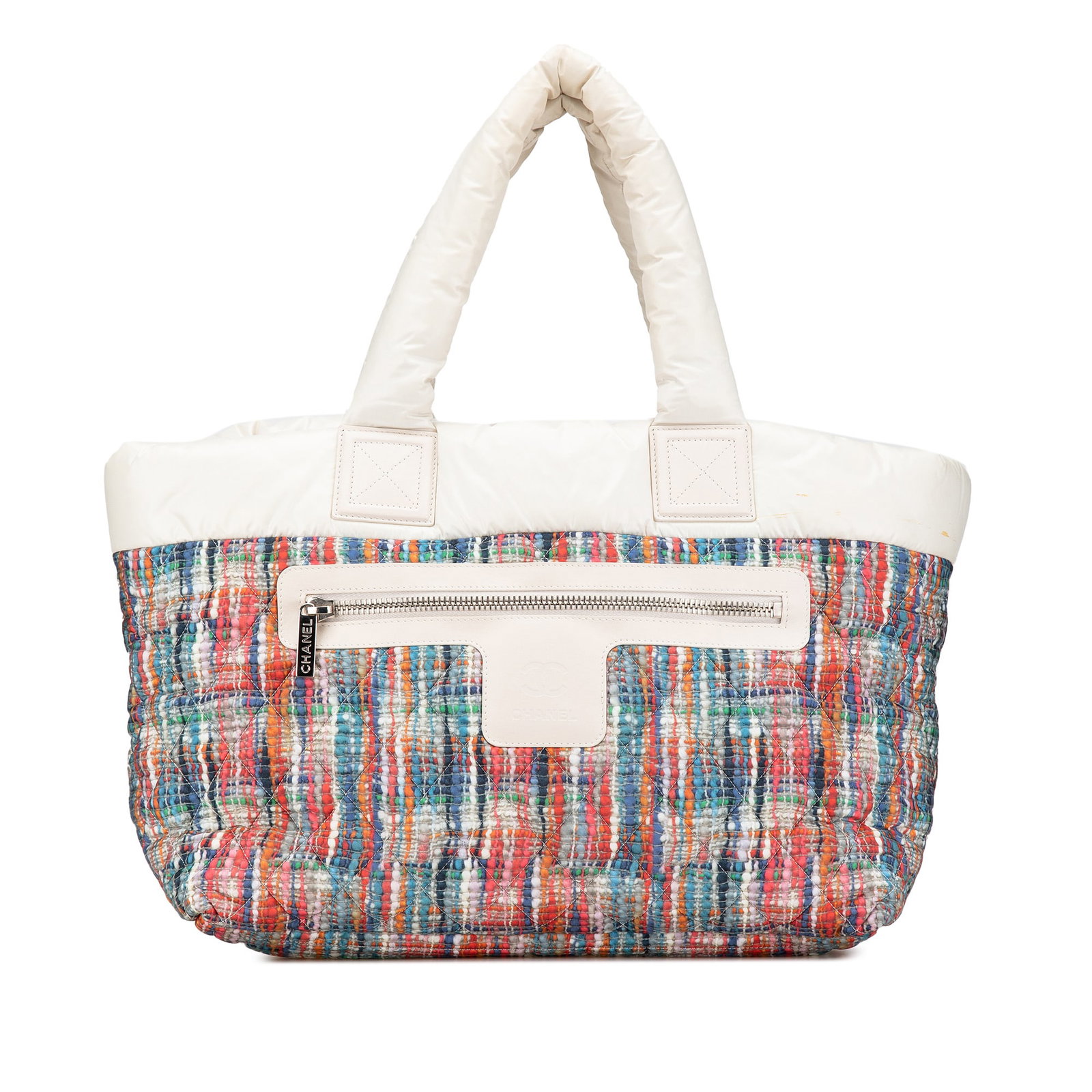 Chanel Coco Cocoon Tote Printed Nylon Tweed Multi Color: Chanel Coco Cocoon Tote Printed Nylon Tweed Multi Color Chanel Nylon Tweed Printed Coco Cocoon Tote made in Italy. This tote bag features a nylon body, rolled nylon handles, an open top with lobster c