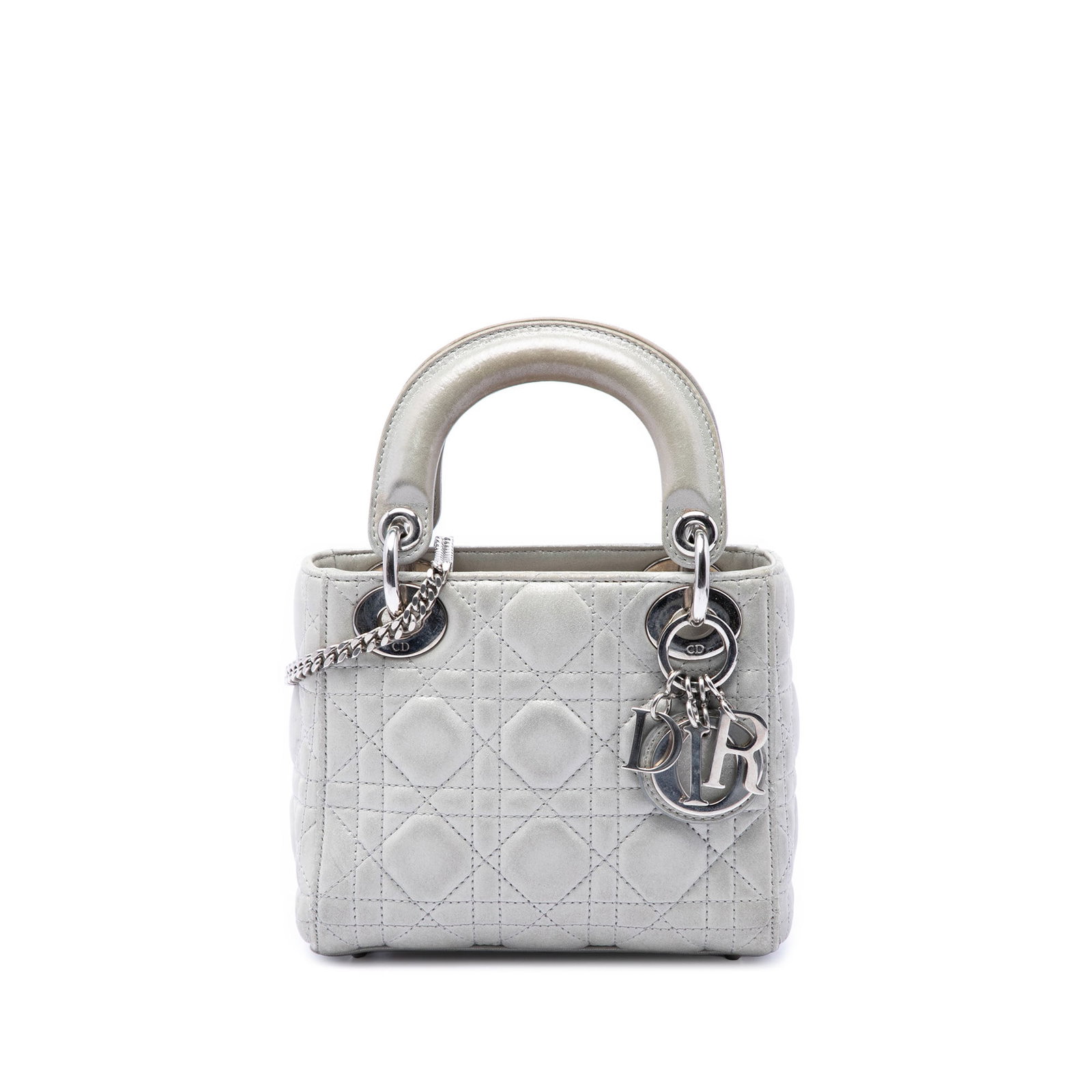 Dior Lady Dior Mini bag in iridescent cannage lambskin: Dior Lady Dior Mini bag in iridescent cannage lambskin Mini Lady Dior bag in iridescent lambskin leather with Cannage quilting. This bag features flat leather top handles, a detachable chain link stra