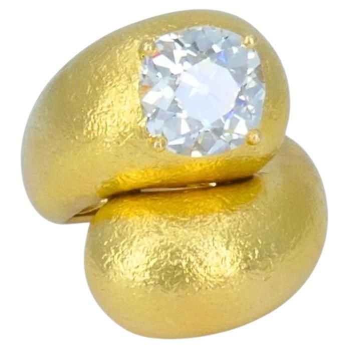 22k Gold Bypass Cocktail Ring with Old European Cut Diamond: 22k Gold Bypass Cocktail Ring with Old European Cut Diamond A gold bypass cocktail ring featuring an Old European cut diamond. The ring has a sculptural, fluid bypass design with a substantial gold ba