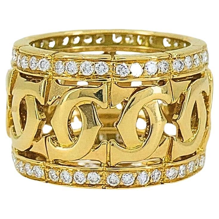 Cartier Entrelaces C de Cartier 18k Yellow Gold Diamond Wide Band Ring: Cartier Entrelaces C de Cartier 18k Yellow Gold Diamond Wide Band Ring Cartier Entrelaces C de Cartier diamond ring with a distinctive wide band design and round brilliant-cut diamonds. Crafted from 1