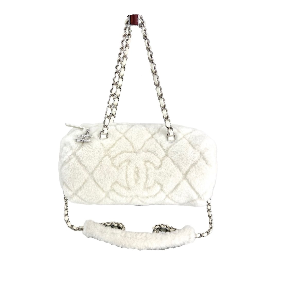 Chanel Shearling Quilted White Lambskin Bowler Crossbody Bag: Chanel Shearling Quilted White Lambskin Bowler Crossbody Bag This elegant Chanel Shearling Quilted Bowler Crossbody Shoulder Bag is crafted from luxurious white lambskin, featuring a chic crescent sha