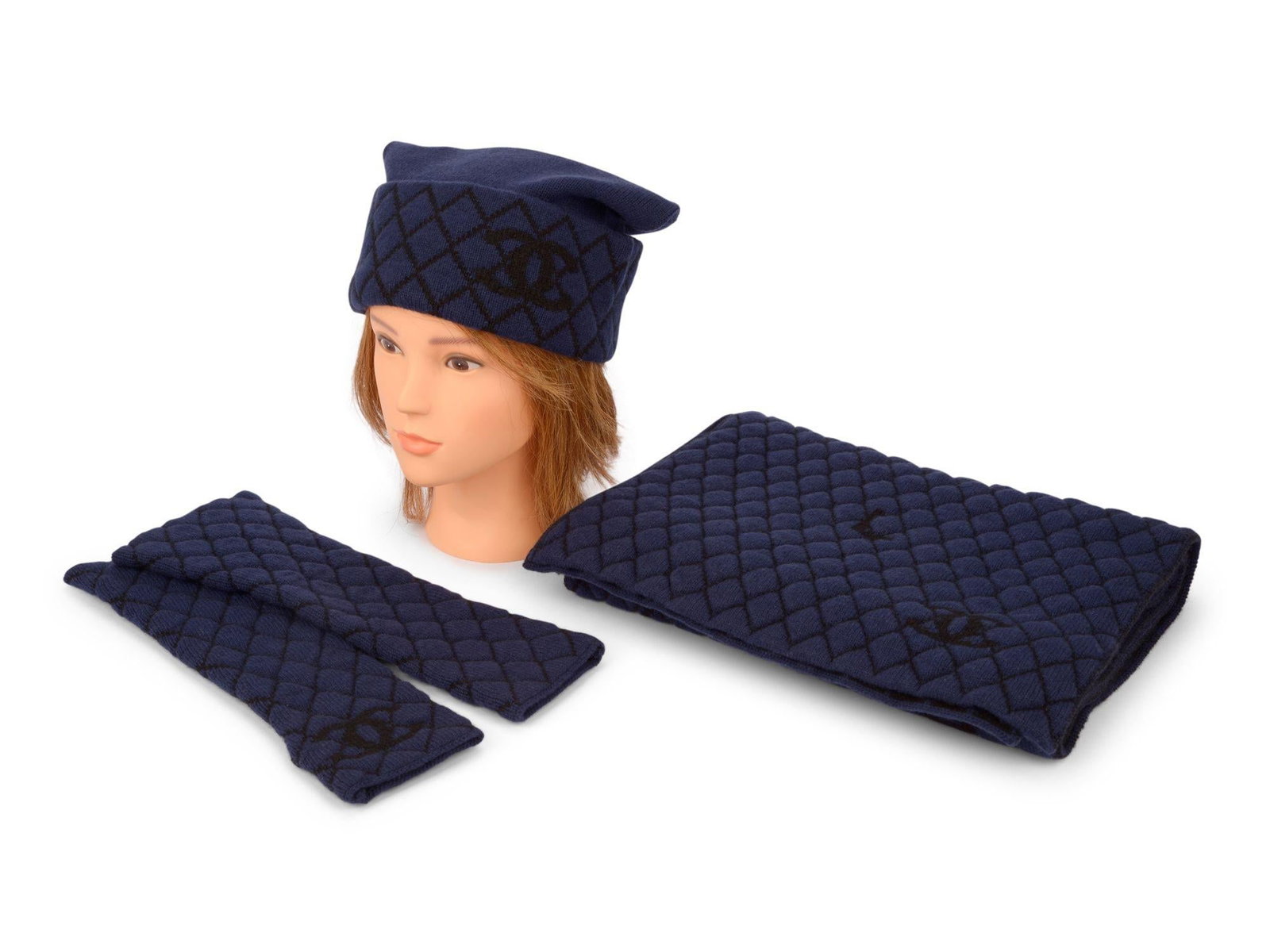 Chanel Navy Knit Hat Gloves Scarf Set Italy 21st Century: Chanel Navy Knit Hat Gloves Scarf Set Italy 21st Century Elevate your winter wardrobe with this exquisite Chanel Navy Hat, Gloves, and Scarf Knit Set. Crafted in Italy, this luxurious set showcases a 
