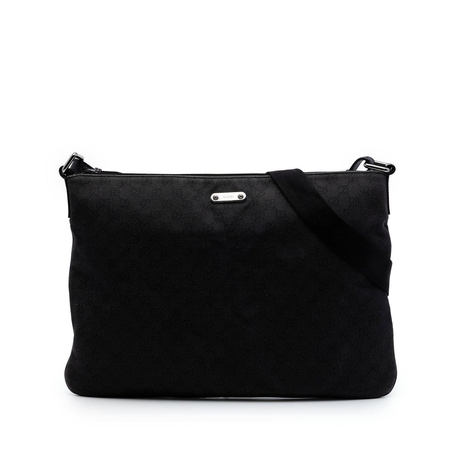 Gucci GG Denim Black Fabric Crossbody Bag: Gucci GG Denim Black Fabric Crossbody Bag Gucci GG Denim Crossbody bag with a denim body, flat strap, top zip closure, and an interior zip pocket. Made in Italy. Condition is B+ with visible wear and 