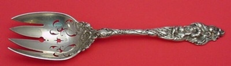 Reed and Barton Les Six Fleurs Sterling Silver 9" Serving Fork: Reed and Barton Les Six Fleurs Sterling Silver 9" Serving Fork This exquisite vegetable serving fork from Reed & Barton features the elegant "Les Six Fleurs" pattern. Crafted from high-quality sterlin