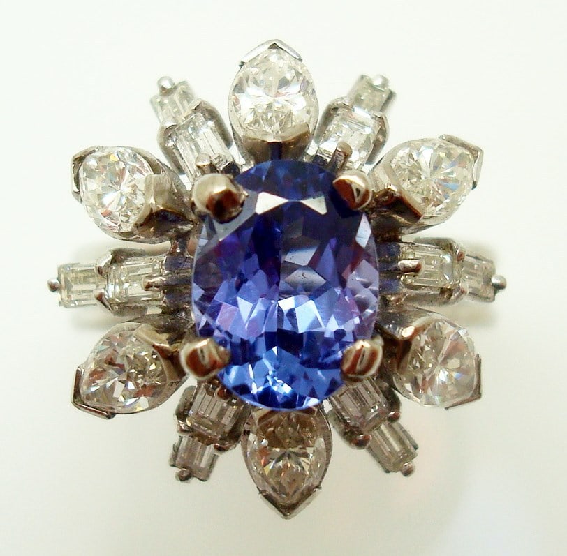 Exquisite 14k White Gold Tanzanite 1.35ct Diamond Ring 1.50ct #J787: Exquisite 14k White Gold Tanzanite 1.35ct Diamond Ring 1.50ct #J787 Adorn your hand with this exquisite 14k white gold cocktail ring, featuring a stunning 1.35ct genuine natural tanzanite at its cente