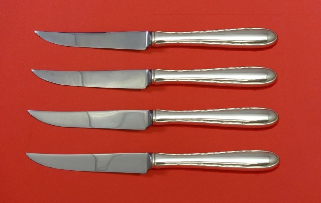 Towle Silver Flutes 4pc Sterling Silver Steak Knife Set Custom 8.5": Towle Silver Flutes 4pc Sterling Silver Steak Knife Set Custom 8.5" Elevate your dining experience with this exquisite 4-piece steak knife set from Towle, featuring the elegant Silver Flutes pattern. 