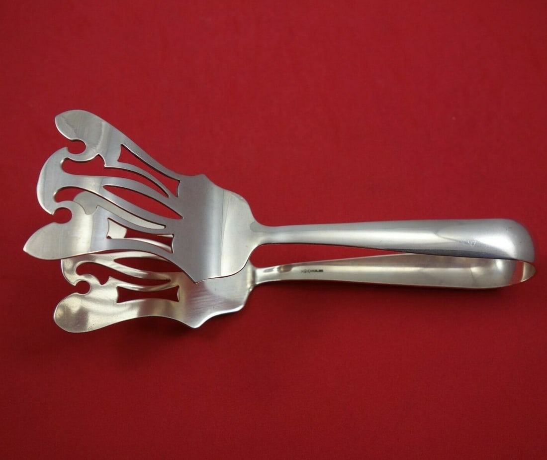 Frank Whiting Colonial Antique Sterling Silver Asparagus Serving Tong 8 1/8": Frank Whiting Colonial Antique Sterling Silver Asparagus Serving Tong 8 1/8" This exquisite 8 1/8" serving tong is crafted from sterling silver and features the elegant Colonial Antique pattern by Fra