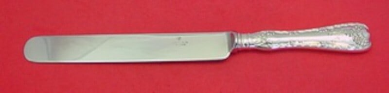 Tiffany & Co Wave Edge Sterling Silver Dinner Knife 10 1/4 Inch: Tiffany & Co Wave Edge Sterling Silver Dinner Knife 10 1/4 Inch This elegant dinner knife features the iconic Wave Edge pattern by Tiffany & Co. Crafted from sterling silver, this knife boasts a hollo