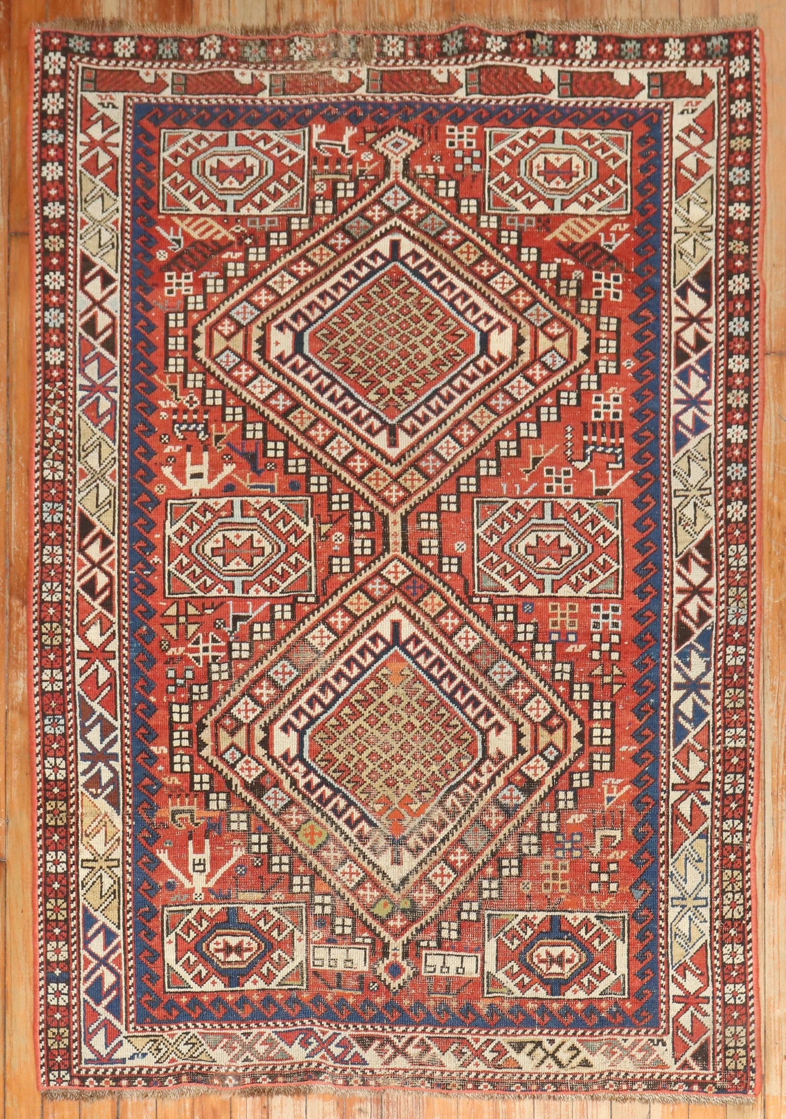 3' 8" x 5' 7" Geometric Caucasian Antique Rug dated 1901: 3' 8" x 5' 7" Geometric Caucasian Antique Rug dated 1901 Antique Caucasian rug with a geometric design, dated 1901. This pre-owned small rug retains its original dated detail and traditional Caucasian