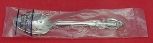 International Sterling Silver Grande Regency Slotted Serving Spoon 8.5 Inch: International Sterling Silver Grande Regency Slotted Serving Spoon 8.5 Inch This exquisite Grande Regency slotted spoon by International Sterling Silver showcases a stunning design characterized by sy