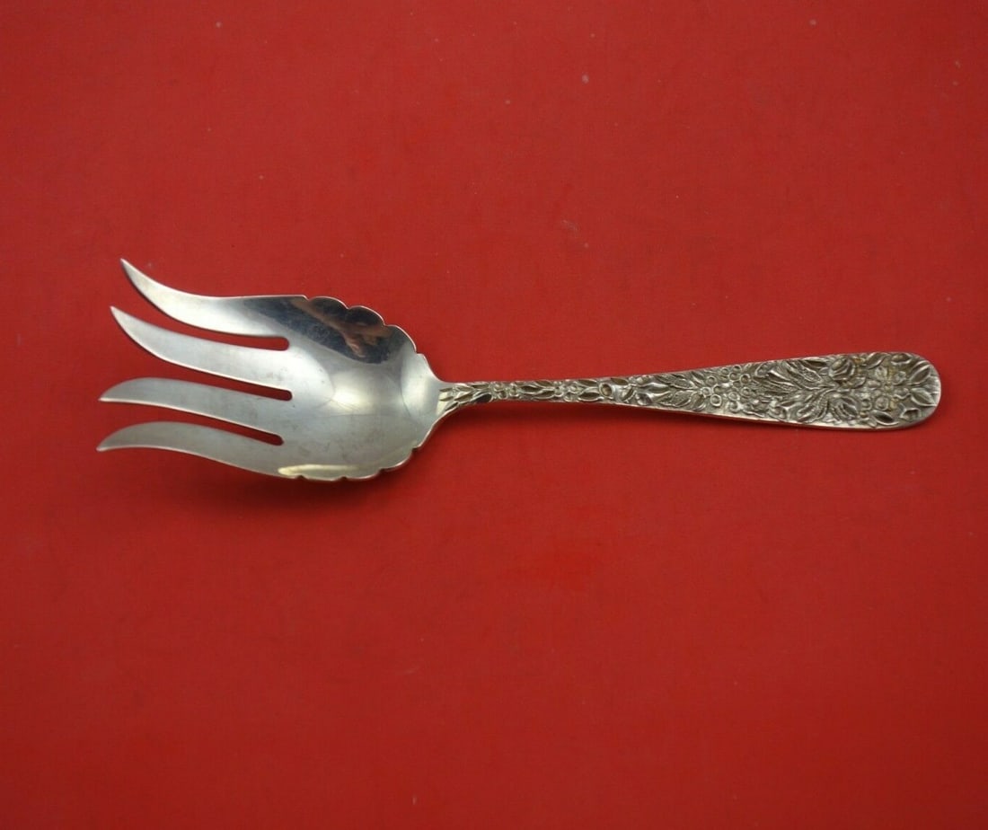 Hennegan Bates Repousse Sterling Silver 7.75" Buffet Fork: Hennegan Bates Repousse Sterling Silver 7.75" Buffet Fork Experience the elegance of the Repousse pattern with this exquisite serving fork by Hennegan & Bates. Crafted from high-quality sterling silve
