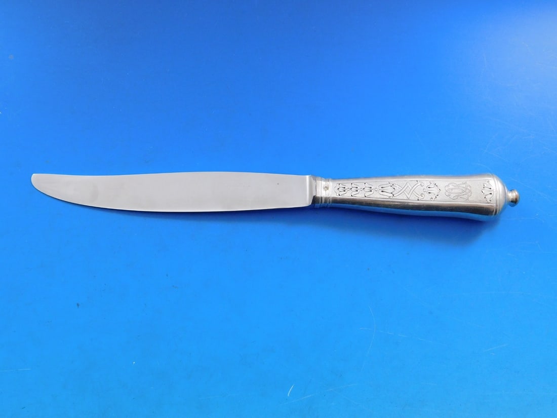 Soubise By Puiforcat Sterling Silver Knife Cannon Handle 8.25": Soubise By Puiforcat Sterling Silver Knife Cannon Handle 8.25" This exquisite Soubise by Puiforcat knife features a stunning cannon handle design, crafted from high-quality sterling silver. Measuring 