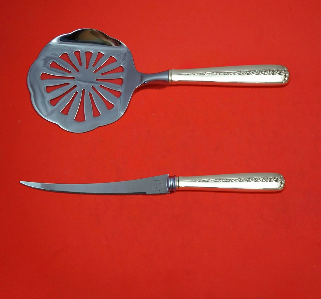 Towle Rambler Rose Sterling Silver 2-Piece Tomato Serving Set: Towle Rambler Rose Sterling Silver 2-Piece Tomato Serving Set This exquisite 2-piece tomato serving set, custom made in the Rambler Rose pattern by Towle, features elegant sterling silver hollow handl