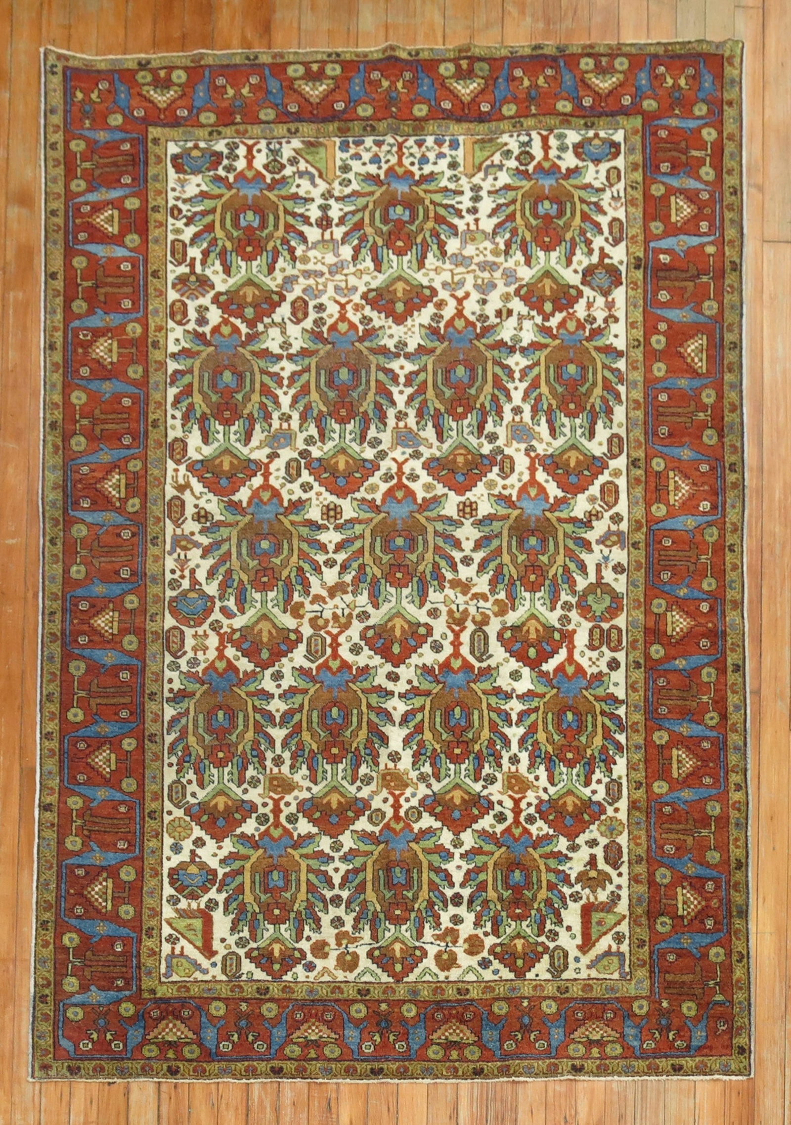 4' 7" x 6' 4" N.W. Persian Accent Rug: 4' 7" x 6' 4" N.W. Persian Accent Rug Early 20th century Northwest Persian accent rug with an ivory field and intricate patterned design. This pre-owned rug is described as a highly collectible exampl