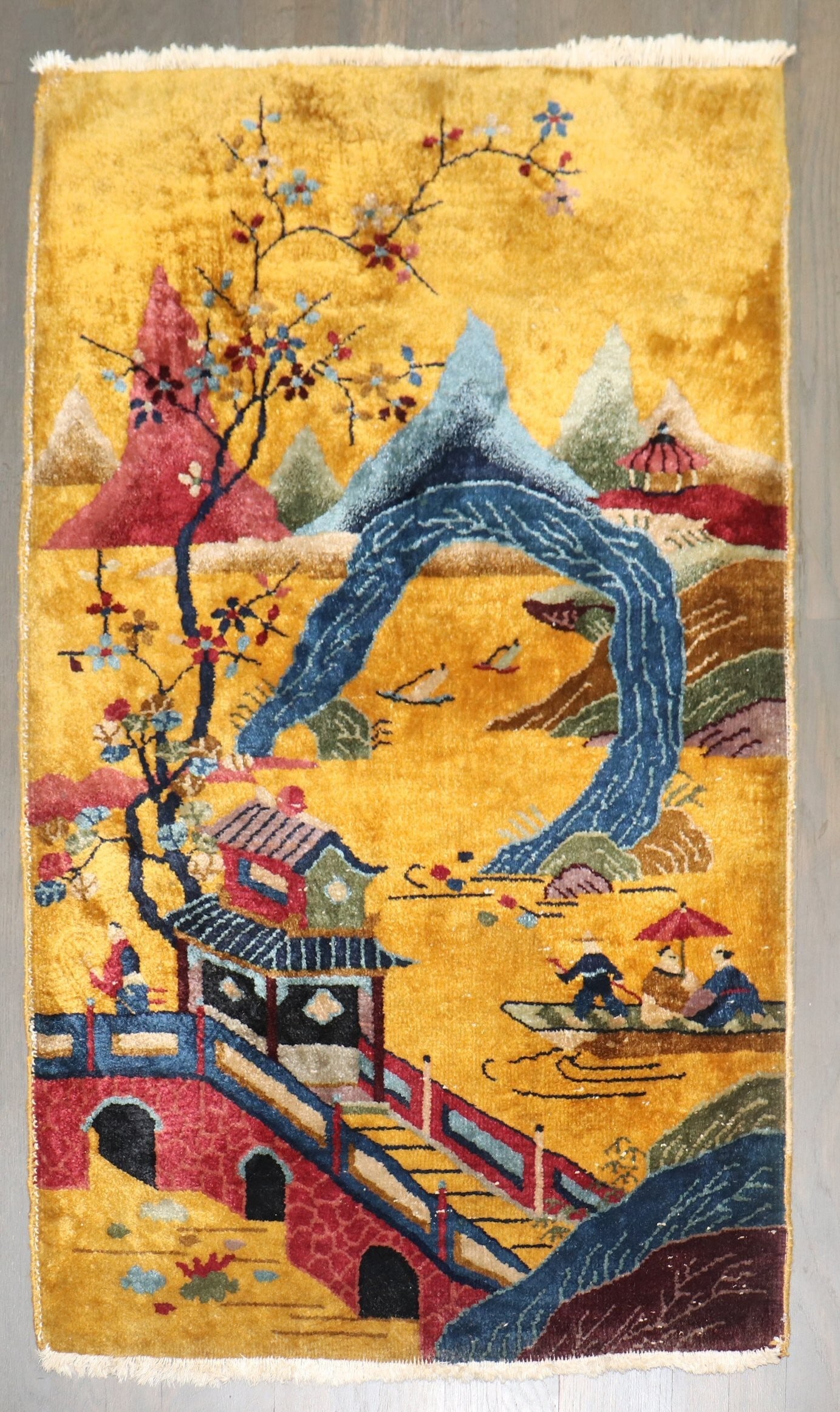 2' 6" x 4' 3" Chinese Deco Rug in Yellow Field: 2' 6" x 4' 3" Chinese Deco Rug in Yellow Field A pre-owned 1930s Art Deco Chinese rug with a yellow field and small-format size. This piece reflects the distinctive Chinese Deco style noted in the ori