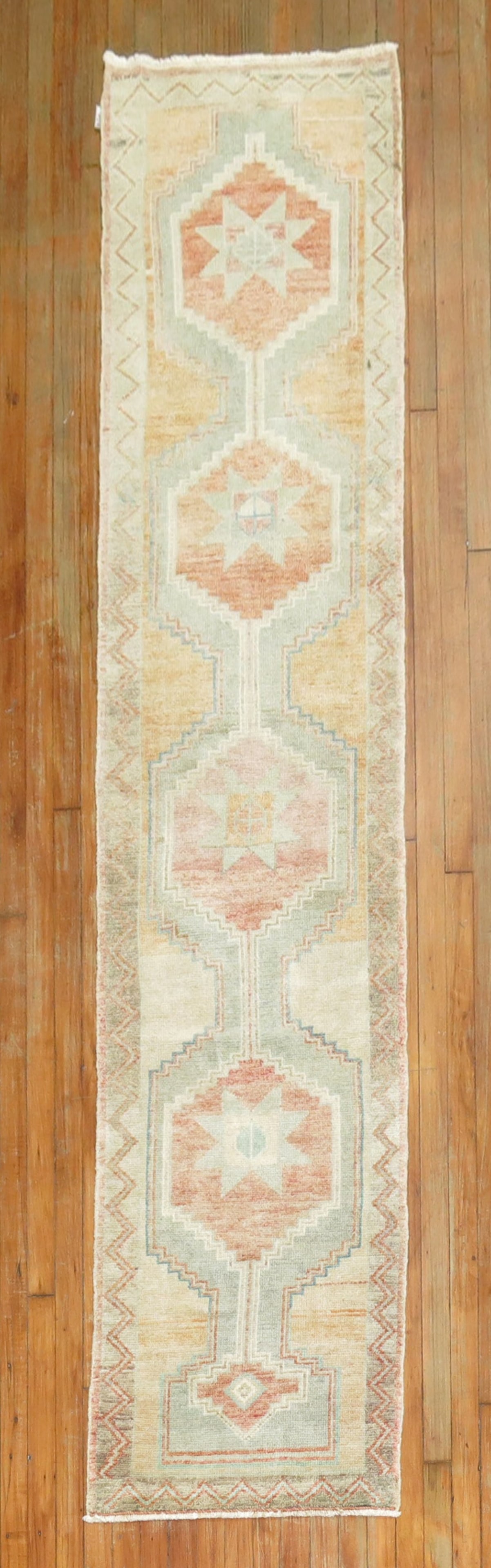2' 2" x 9' 4" Mid 20th Turkish Anatolian Rug Runner: 2' 2" x 9' 4" Mid 20th Turkish Anatolian Rug Runner Mid 20th century Turkish Anatolian runner with a narrow profile and geometric design in warm summer tones. Pre-owned. Specifications Origin: Turkey 