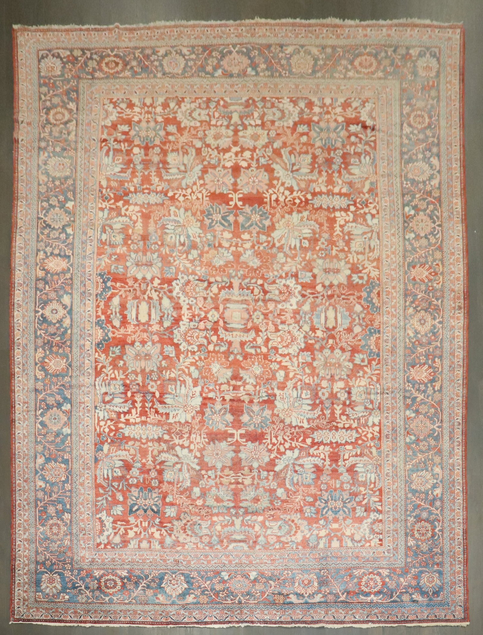 10' 7" x 14' 1" Persian Mahal Carpet Early 20th Century: 10' 7" x 14' 1" Persian Mahal Carpet Early 20th Century Early 20th century Persian Mahal carpet in a red colorway. This pre-owned room-size carpet is identified as a Sultanabad/Mahal type. Specificati