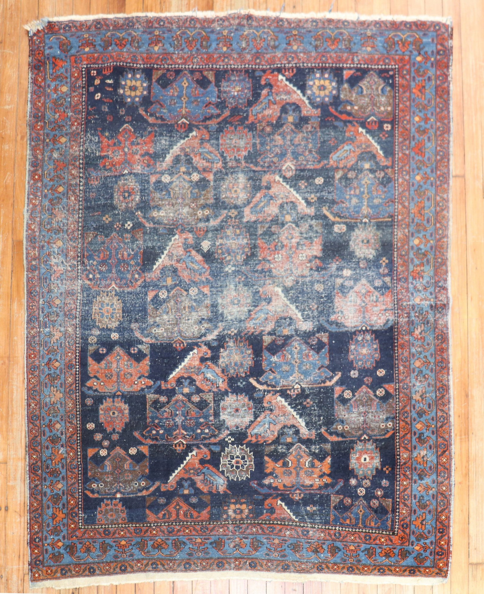 4' 6" x 5' 7" Afshar Persian Accent Rug Navy Field: 4' 6" x 5' 7" Afshar Persian Accent Rug Navy Field Early 20th century tribal Persian Tafshar scatter rug with an all-over design on a navy field. This square-size accent rug is described as Afshar and