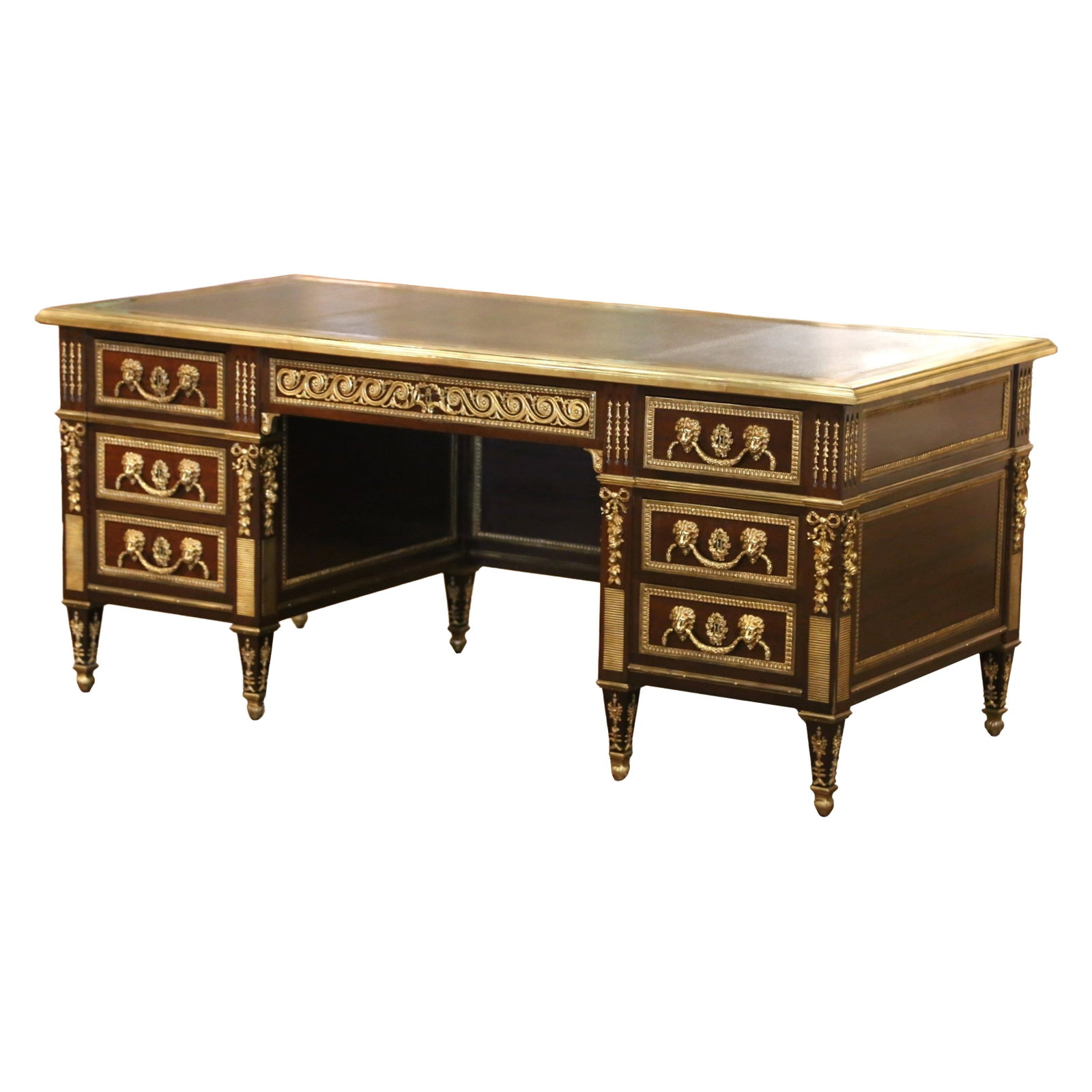 French Louis XVI partner desk in mahogany bronze and leather top: French Louis XVI partner desk in mahogany bronze and leather top Late 19th century French Louis XVI partner desk crafted in mahogany with gilt-bronze mounts and an original three-panel black leather w