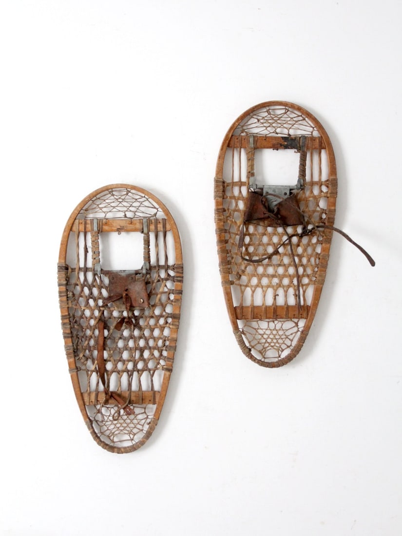 1945 Groswold Ski Company US Military Snowshoes Pair: 1945 Groswold Ski Company US Military Snowshoes Pair Authentic 1945 U.S. military snowshoes crafted by The Groswold Ski Company. Constructed with woven rawhide, aged leather bindings, and wood, these 