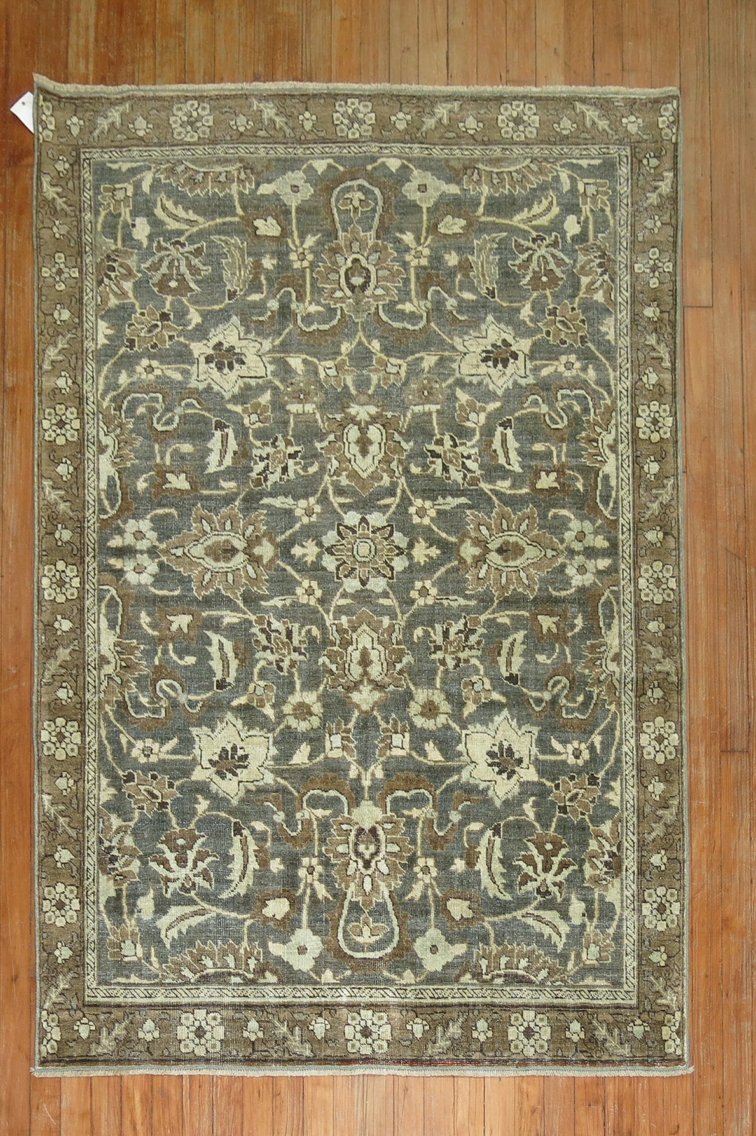 4' 2" x 6' Persian Serapi Heriz Accent Rug: 4' 2" x 6' Persian Serapi Heriz Accent Rug A pre-owned 1920s Persian Serapi/Heriz accent rug with a rectangular form and an intricate floral and geometric pattern. Specifications Origin: Persian Type: