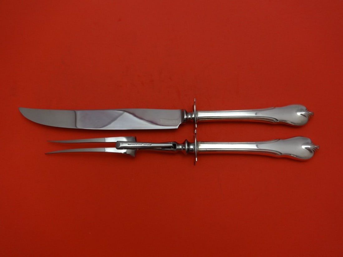 Wallace Grand Colonial Sterling Silver Carving Set 2pc Knife and Fork: Wallace Grand Colonial Sterling Silver Carving Set 2pc Knife and Fork Enhance your dining experience with this elegant 2-piece roast carving set in the Grand Colonial pattern by Wallace. Crafted from 