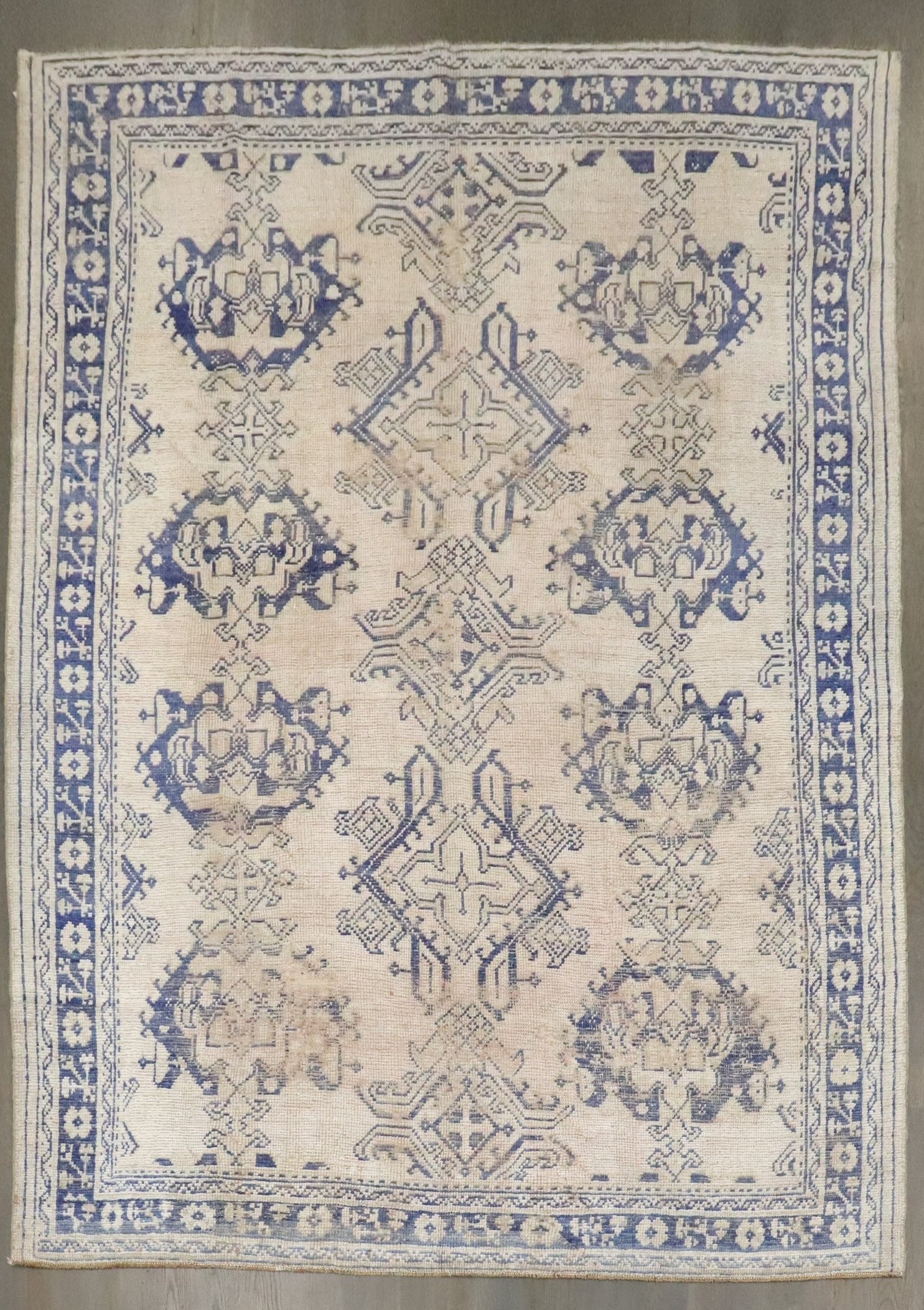7' 1" x 9' 7" Antique Oushak Rug Crab Design: 7' 1" x 9' 7" Antique Oushak Rug Crab Design Early 20th century antique Oushak rug featuring a Crab design. This pre-owned piece is categorized as an intermediate room-size rug and is also described a