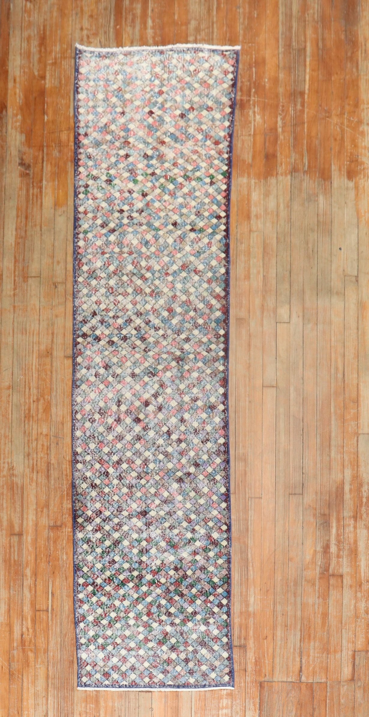 2' 3" x 10' 5" Mid 20th Century Turkish Shabby Chic Runner: 2' 3" x 10' 5" Mid 20th Century Turkish Shabby Chic Runner Mid 20th century Turkish Deco runner with a Shabby Chic style. This pre-owned rug features a long, narrow runner format suitable for hallways