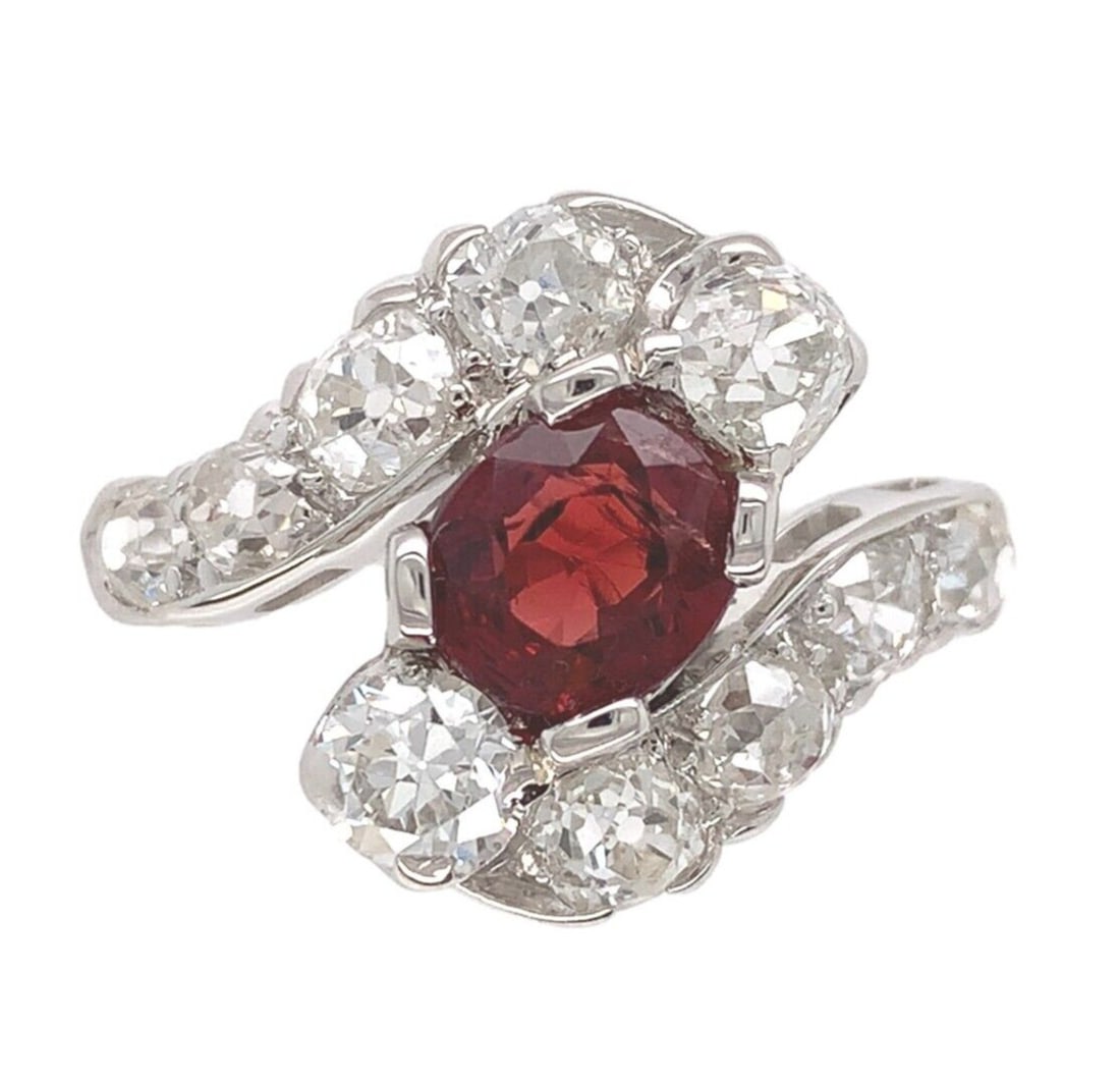 Edwardian Platinum 1.29ct Red Spinel & 1.75ct Diamond Ring: Edwardian Platinum 1.29ct Red Spinel & 1.75ct Diamond Ring This exquisite Edwardian ring features a stunning 1.29ct natural red spinel, beautifully complemented by ten mine cut and European cut diamon