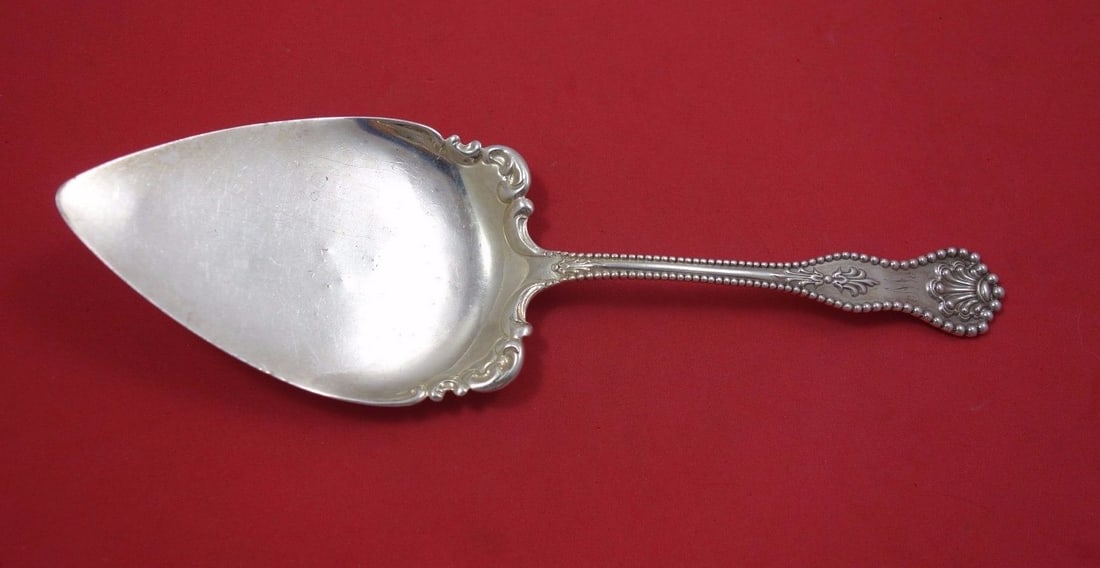 Dominick & Haff Charles II Sterling Silver Pie Server 9 3/8 Inch: Dominick & Haff Charles II Sterling Silver Pie Server 9 3/8 Inch This exquisite Charles II pie server, crafted by Dominick & Haff, showcases the elegance of 19th-century design. Made entirely from ste