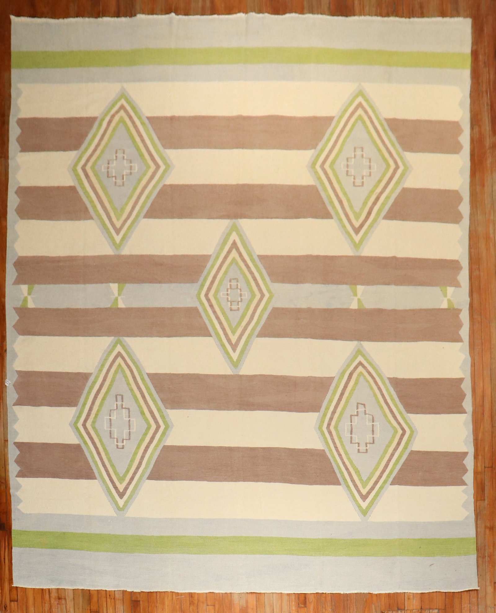 10' 8" x 15' 4" Oversize Turkish Kilim Geometric Pattern: 10' 8" x 15' 4" Oversize Turkish Kilim Geometric Pattern One-of-a-kind Turkish Kilim from the 3rd quarter of the 20th century, featuring an all-over large-scale geometric pattern in ivory, green, khak