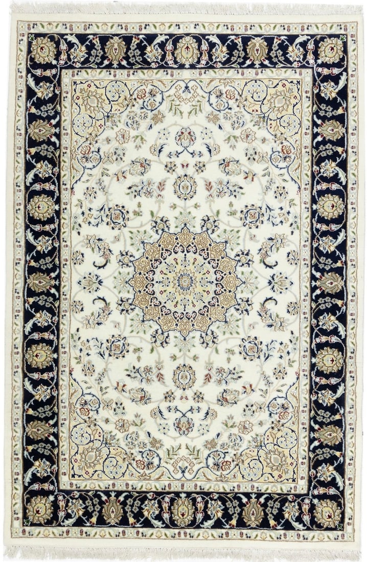 Cream Floral Medallion Wool and Silk 4'3 x 6'3 Hand-Knotted Area Carpet: Cream Floral Medallion Wool and Silk 4'3 x 6'3 Hand-Knotted Area Carpet This Indo-Nain area rug features a floral medallion pattern in a cream color palette with accents of dark navy, buff red, light 