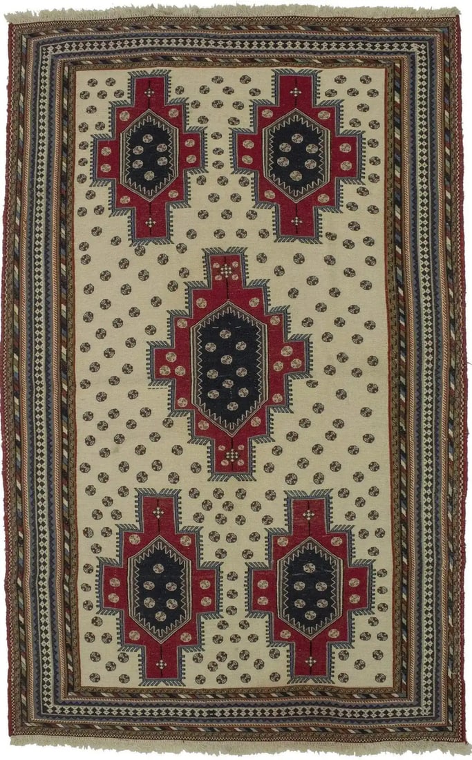 6'7 x 4'1 Wool Tribal Geometric Hand-Knotted Area Rug: 6'7 x 4'1 Wool Tribal Geometric Hand-Knotted Area Rug This hand-knotted tribal geometric area rug features a modern design with a rich palette of cream, red, navy blue, light blue, and khaki tones. Ex