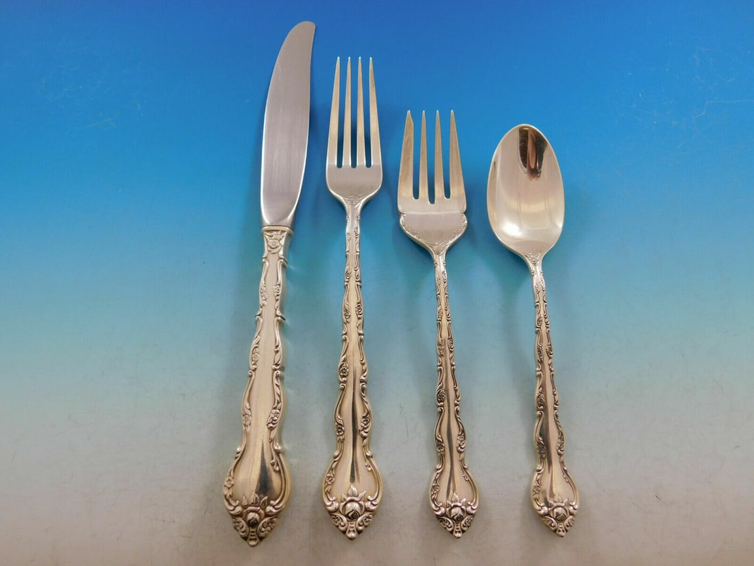 Feliciana by Wallace Sterling Silver 4-Piece Flatware Set: Feliciana by Wallace Sterling Silver 4-Piece Flatware Set Enhance your dining experience with this exquisite Feliciana by Wallace Sterling Silver Regular Place Setting. This 4-piece set features a mod