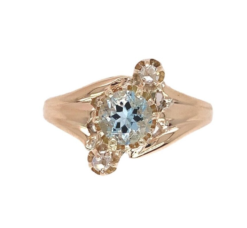 Victorian 10k Rose Gold Aquamarine Ring with Diamonds GIA Certified: Victorian 10k Rose Gold Aquamarine Ring with Diamonds GIA Certified Experience the elegance of this stunning Victorian-era ring crafted in 10k rose gold. This exquisite piece features a genuine natura