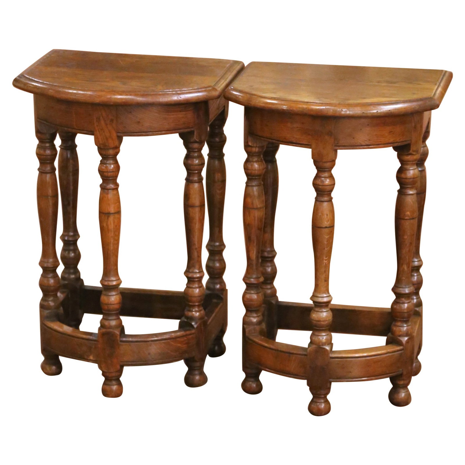 Set of Two French Oak Louis XIII Revival Bow-Front Side Tables Circa 1920: Set of Two French Oak Louis XIII Revival Bow-Front Side Tables Circa 1920 This pair of early 20th-century French Louis XIII revival side tables, crafted around 1920, exemplifies refined craftsmanship 