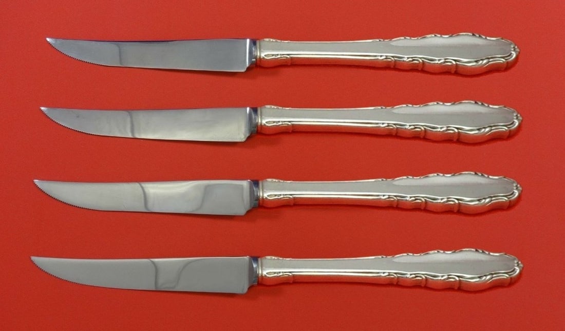 Reed & Barton English Provincial Sterling Silver Steak Knife Set 4pc: Reed & Barton English Provincial Sterling Silver Steak Knife Set 4pc Enhance your dining experience with this exquisite 4-piece steak knife set in the English Provincial pattern by Reed & Barton. Craf