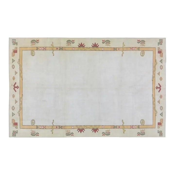 5'7x9 Vintage Turkish Oushak Wool Hand Knotted Rug: 5'7x9 Vintage Turkish Oushak Wool Hand Knotted Rug This vintage Turkish Anatolian Oushak rug features a hand-knotted construction and a soft wool texture. It is presented in a white color and retains 