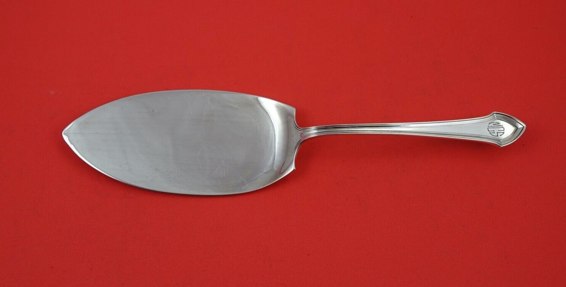 Durgin Essex Sterling Silver Pie Server 9 3/4" Monogrammed: Durgin Essex Sterling Silver Pie Server 9 3/4" Monogrammed This exquisite Essex Pie Server by Durgin is crafted from high-quality sterling silver, showcasing a timeless design that dates back to the e