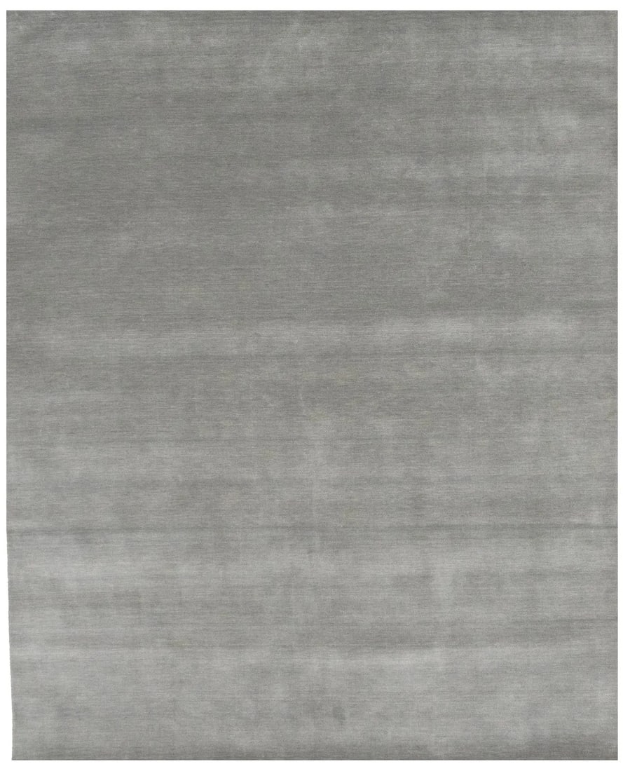 Hand-Loomed Gray Wool Gabbeh Rug 8x10 Modern Home Decor: Hand-Loomed Gray Wool Gabbeh Rug 8x10 Modern Home Decor Enhance your living space with this stunning Gray Solid Design Hand-Loomed Gabbeh Wool Rug. Crafted with care, this area rug measures 8'0" x 9'1