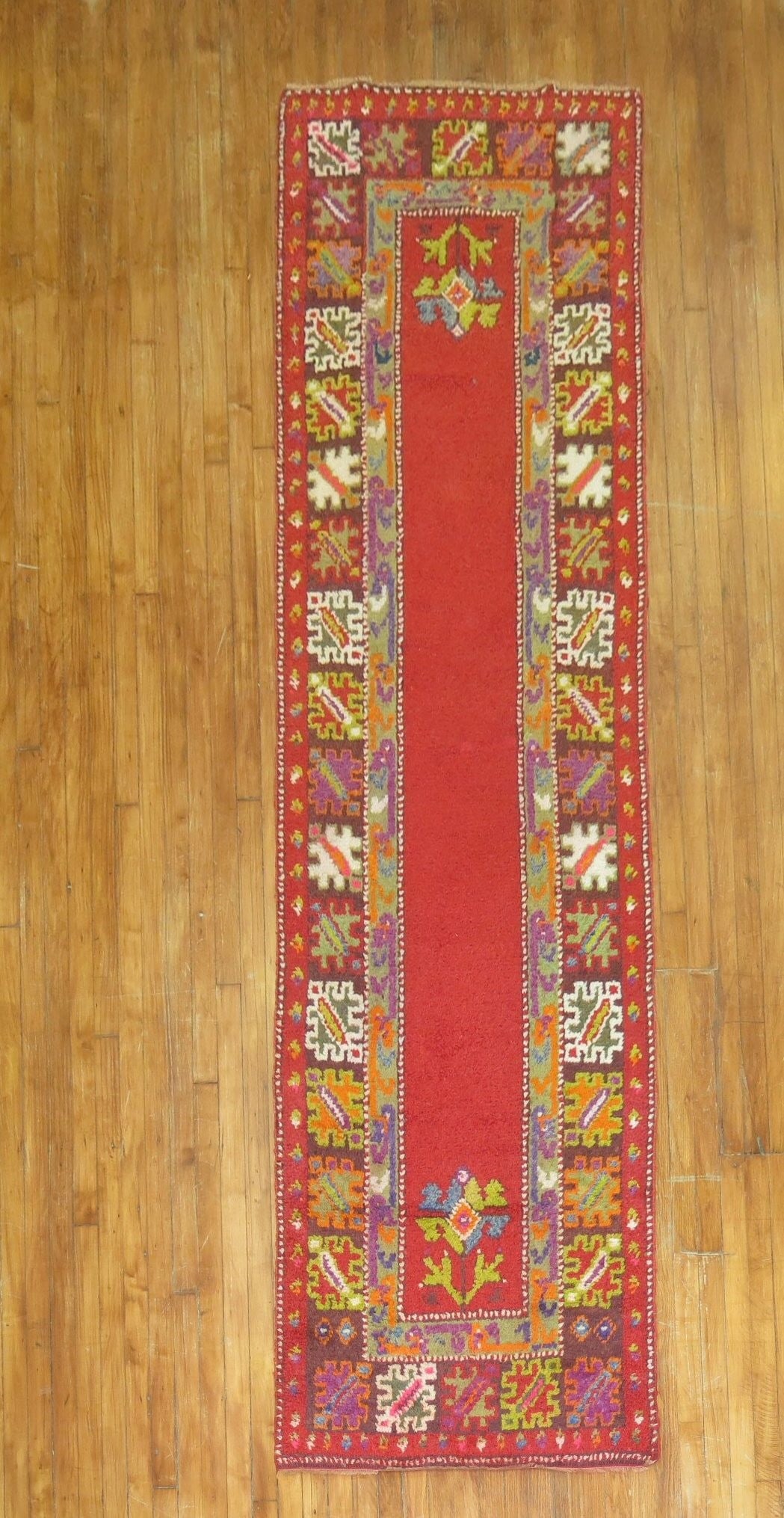 Mid 20th Century Turkish Tulu Rug Runner 2' 11" x 10' 4": Mid 20th Century Turkish Tulu Rug Runner 2' 11" x 10' 4" Mid 20th century Turkish Tulu runner with a bright palette and a traditional elongated runner format. This pre-owned rug is identified as a Tul