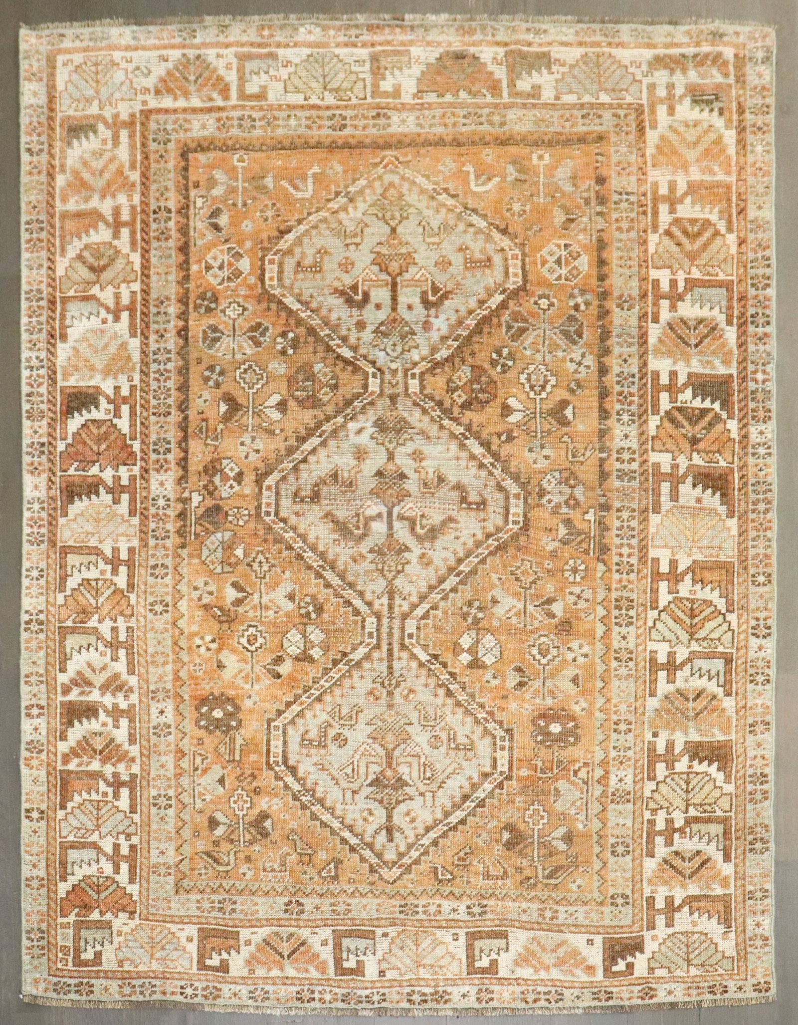 3' 11" x 4' 9" Tribal Shiraz Rug Persian Orange: 3' 11" x 4' 9" Tribal Shiraz Rug Persian Orange Early 20th century tribal Shiraz rug in an orange palette. This pre-owned Persian rug is categorized as a small, square-format piece. Specifications Typ