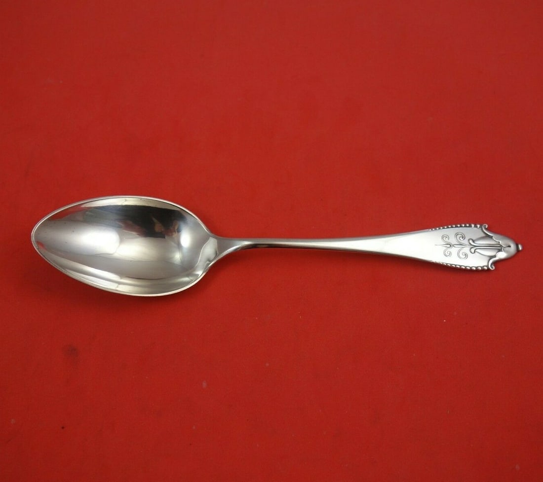 Georg Jensen Akkeleje Sterling Silver Dessert Spoon 6.75": Georg Jensen Akkeleje Sterling Silver Dessert Spoon 6.75" Discover the elegance of the Akkeleje dessert spoon by Georg Jensen, crafted from high-quality sterling silver. This exquisite piece measures 
