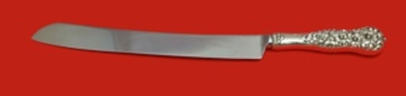 Dominick and Haff Rococo Sterling Silver Cake Knife 12: Dominick and Haff Rococo Sterling Silver Cake Knife 12 This is a Rococo pattern wedding cake knife by Dominick & Haff, crafted in the United States between 1850 and 1899. The knife features a sterling