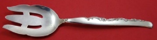 Oneida Flower Lane Sterling Silver Cold Meat Fork 8 1/4": Oneida Flower Lane Sterling Silver Cold Meat Fork 8 1/4" Introducing the Flower Lane Serving Fork by Oneida, a stunning piece crafted from high-quality sterling silver. This cold meat fork measures 8 