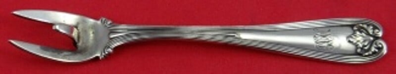 Tiffany & Co Colonial Sterling Silver Lemon Fork 4 1/8 Inch Monogrammed: Tiffany & Co Colonial Sterling Silver Lemon Fork 4 1/8 Inch Monogrammed Enhance your dining experience with this exquisite Colonial Lemon Fork by Tiffany & Co. Crafted from high-quality sterling silve