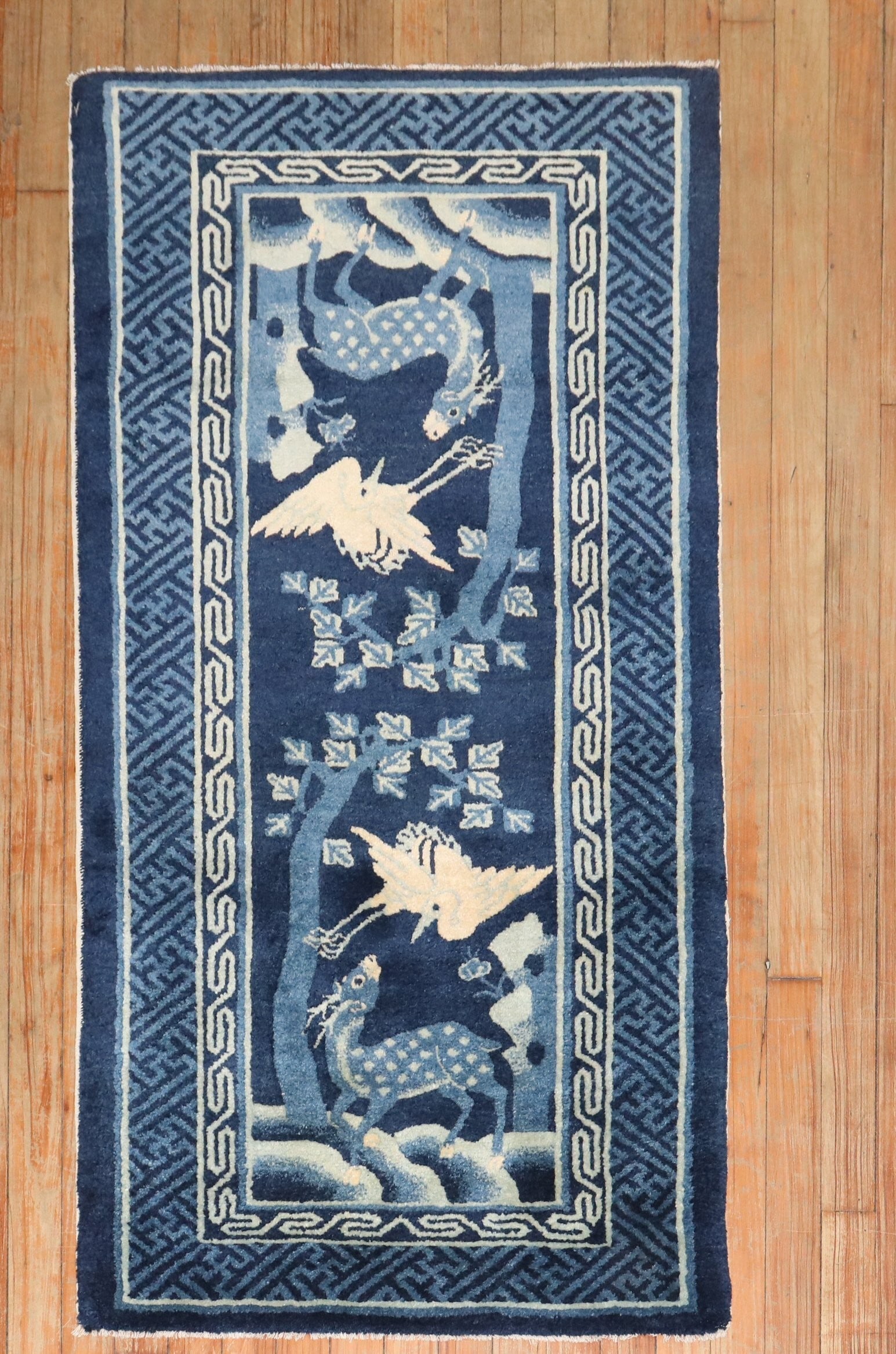 2' 4" x 4' 5" Chinese Peking Pictorial Blue Rug: 2' 4" x 4' 5" Chinese Peking Pictorial Blue Rug Pre-owned Chinese Peking pictorial rug from the 1930s in a blue colorway. This small rectangular rug features a pictorial design consistent with the ori